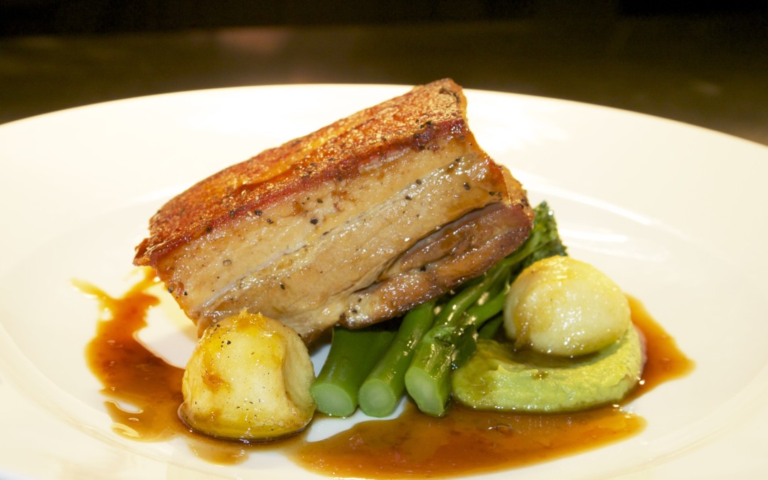 Crispy belly pork with smoked broccoli purée, tenderstem broccoli and caramelised apples