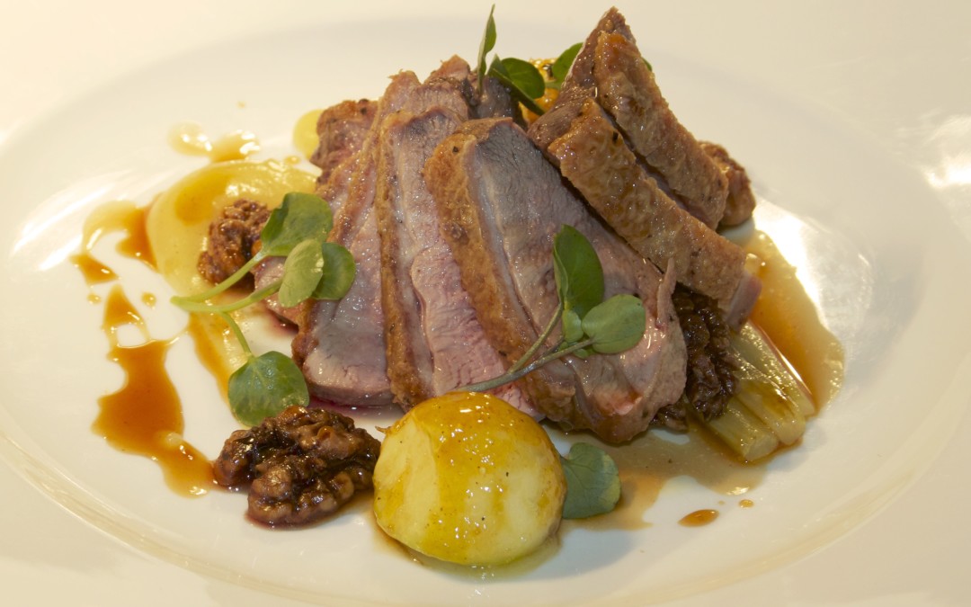 Goosnargh duck breast with apple braised celery and walnuts